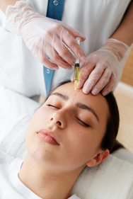 A woman undergoing skin boosters treatment