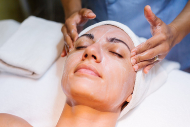 A woman undergoing chemical peels treatment